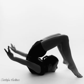 Contortionist performing a handstand